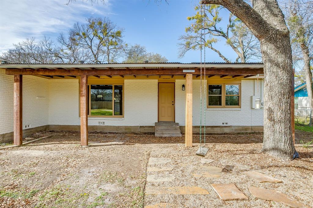 103 Vanshire Road West Lakeside, TX 76108 - Photo 39 of 39 a view of a house with a wooden house and a yard