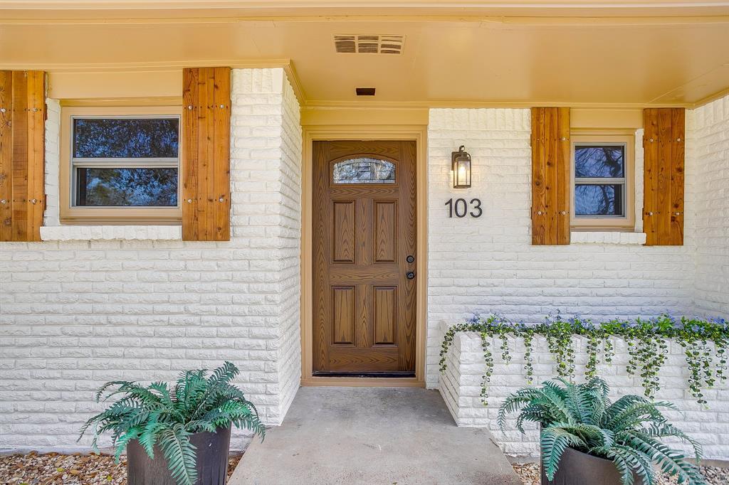 103 Vanshire Road West Lakeside, TX 76108 - Photo 5 of 39 a potted plant sitting in front of a door
