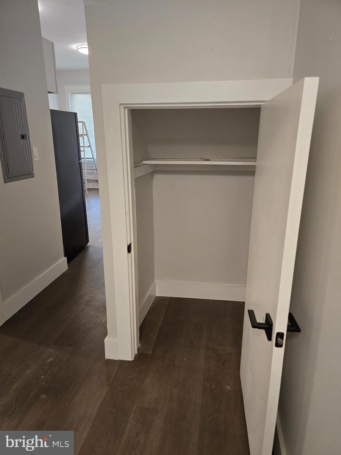 1321 West Wingohocking Street, Unit 1 Philadelphia, PA 19140 - Photo 11 of 19 a view of an empty room with wooden floor and a window