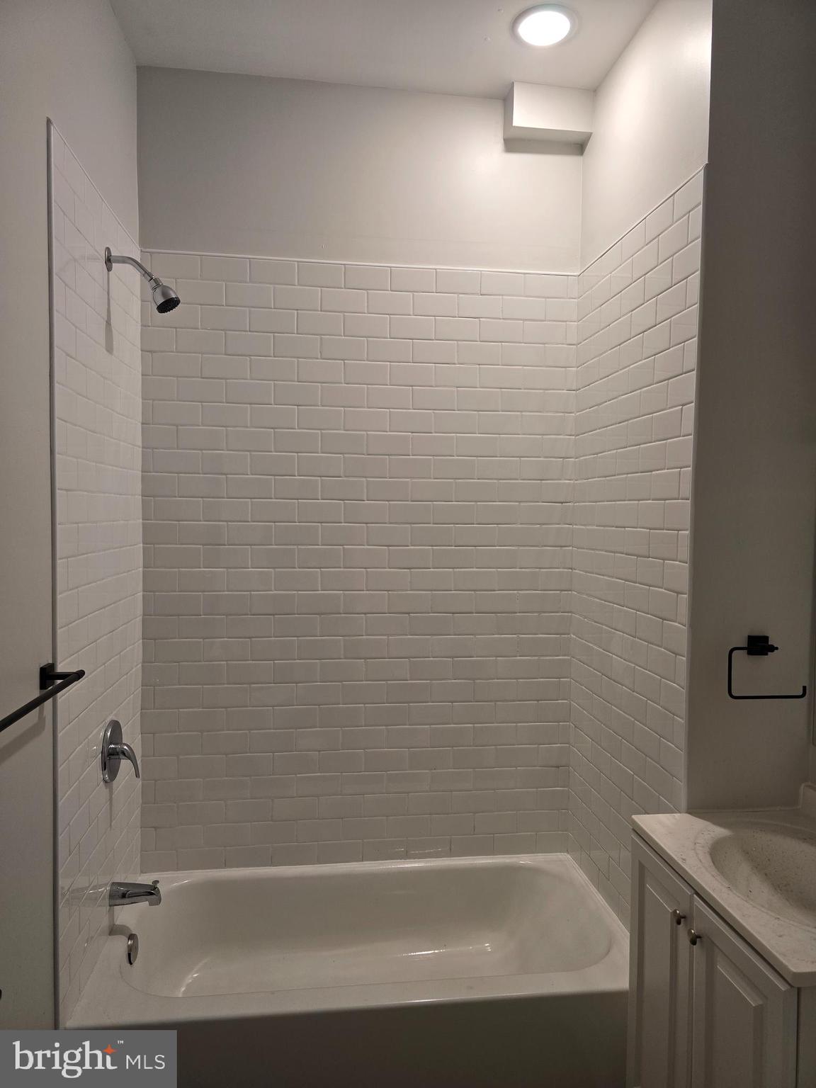 1321 West Wingohocking Street, Unit 1 Philadelphia, PA 19140 - Photo 18 of 19 a bathroom with a shower and a toilet