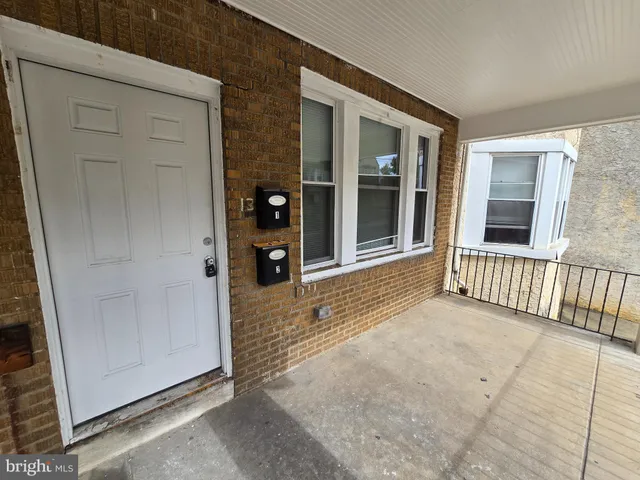 front view of a house with a glass door