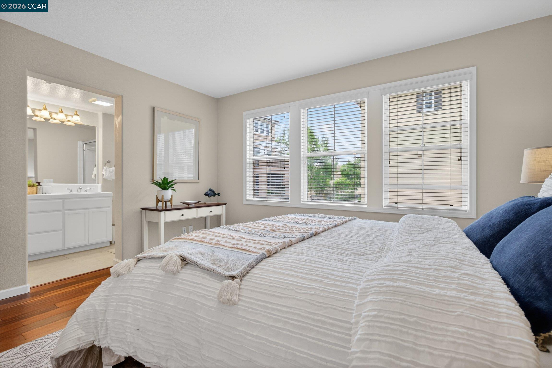 4300 Keegan Street Dublin, CA 94568 - Photo 19 of 33 a bedroom with a bed and wooden floor