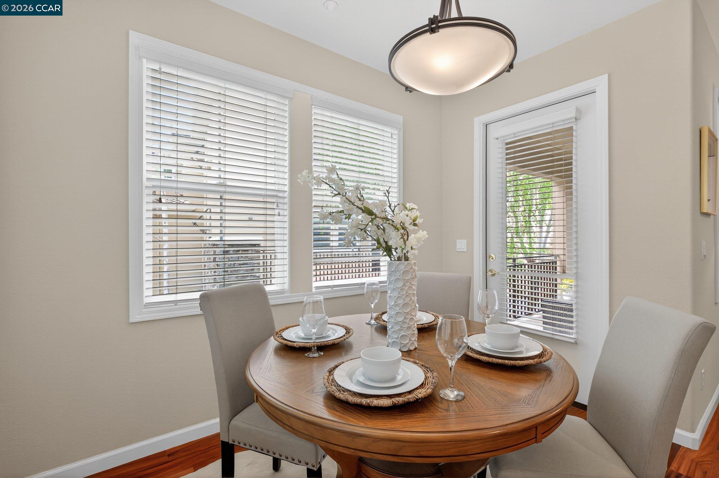 4300 Keegan Street Dublin, CA 94568 - Photo 7 of 33 a view of a dining room with furniture and wooden floor