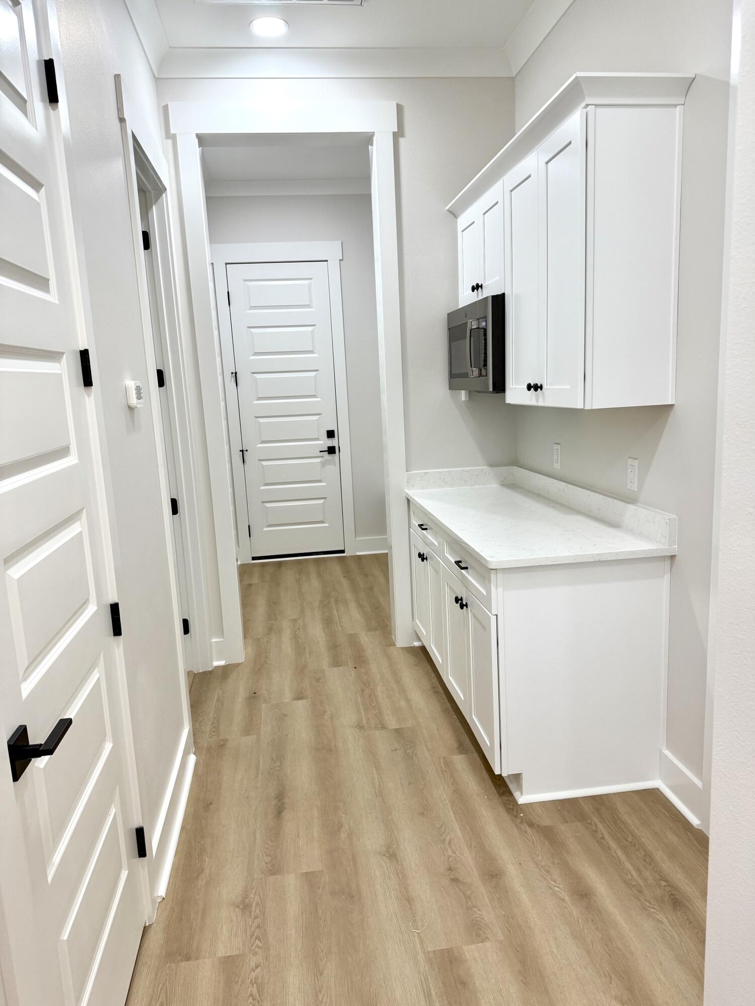 246 Foxglove Run Niceville, FL 32578 - Photo 13 of 40 a view of a kitchen with wooden floor