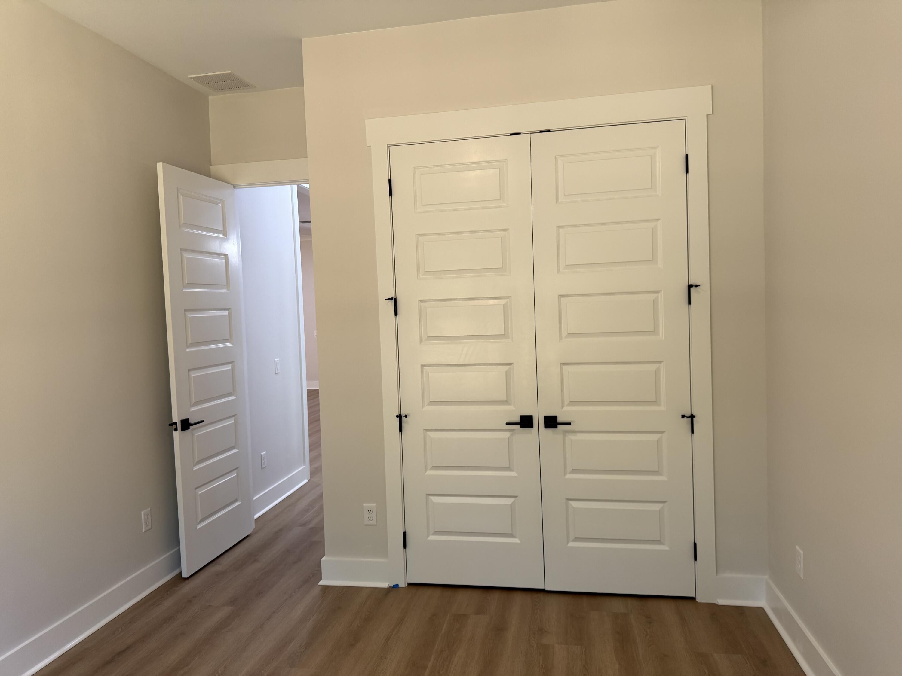 246 Foxglove Run Niceville, FL 32578 - Photo 31 of 40 wooden floor in an empty room