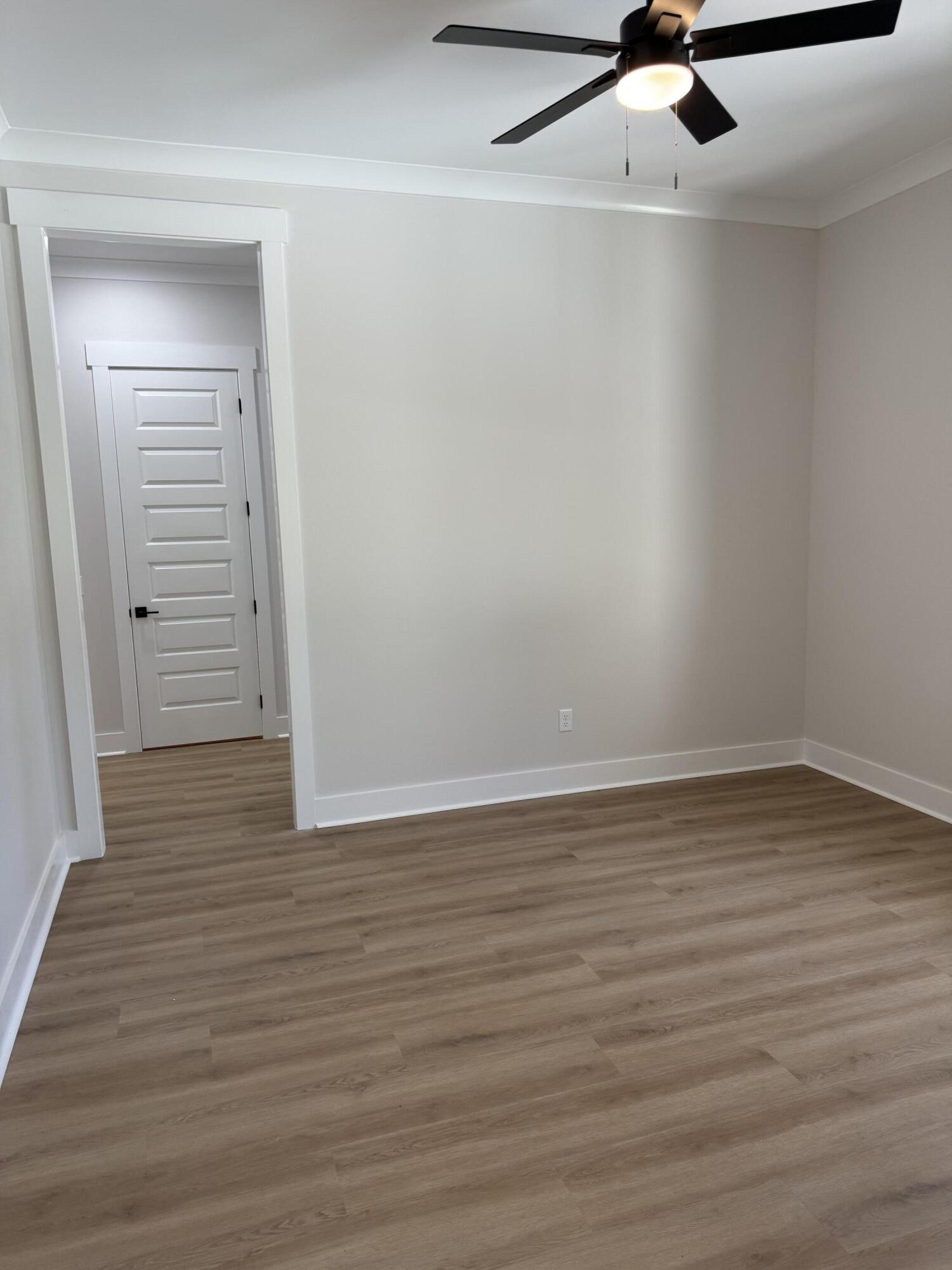246 Foxglove Run Niceville, FL 32578 - Photo 5 of 40 wooden floor in an empty room