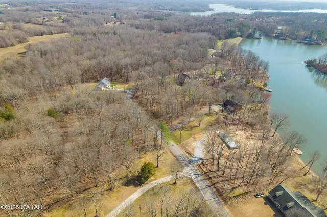 a view of a lake in middle of the house