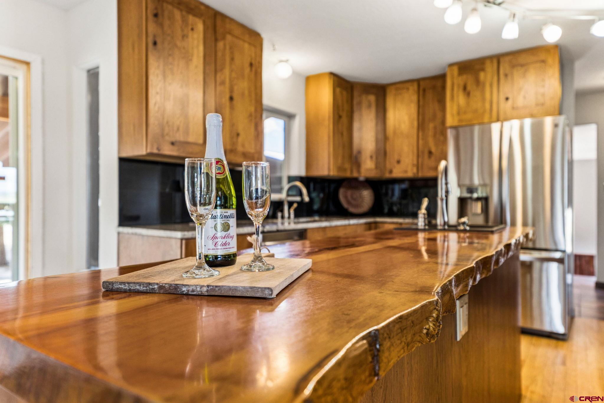 22480 Rd L Cortez, CO 81321 - Photo 12 of 44 a kitchen with a large window and a counter top space