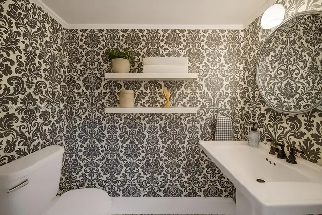 a bathroom with a sink and a toilet