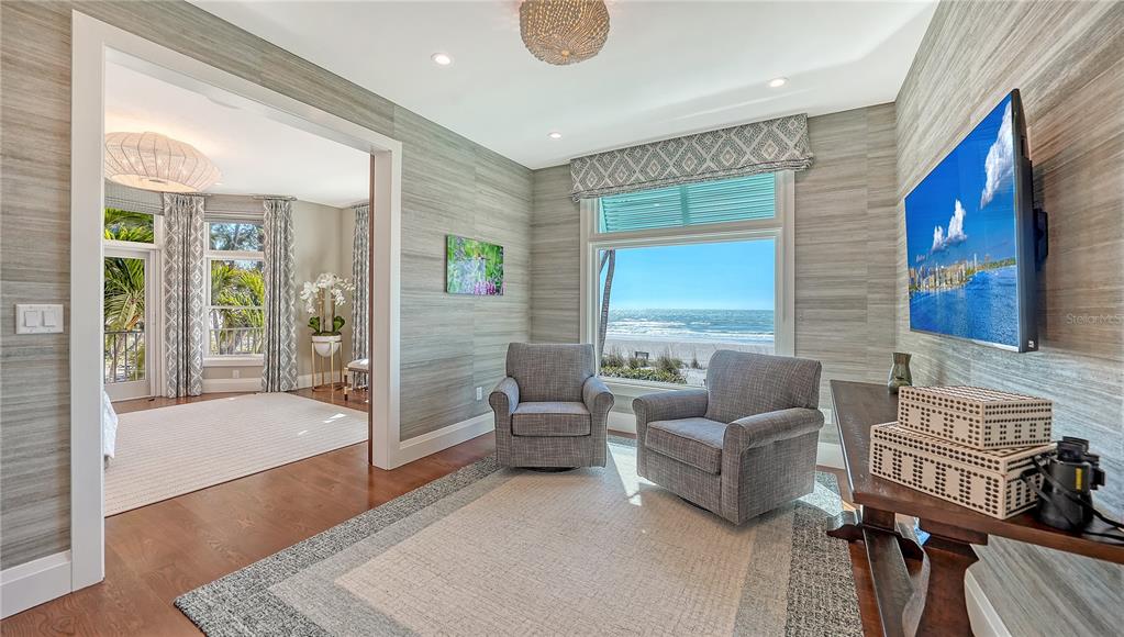 95 52nd Street Holmes Beach, FL 34217 - Photo 21 of 73 a living room with furniture and a large window