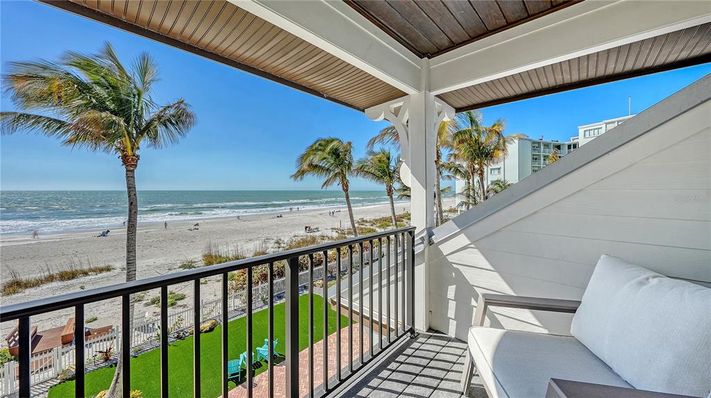 95 52nd Street Holmes Beach, FL 34217 - Photo 34 of 73 a view of a balcony with potted plants