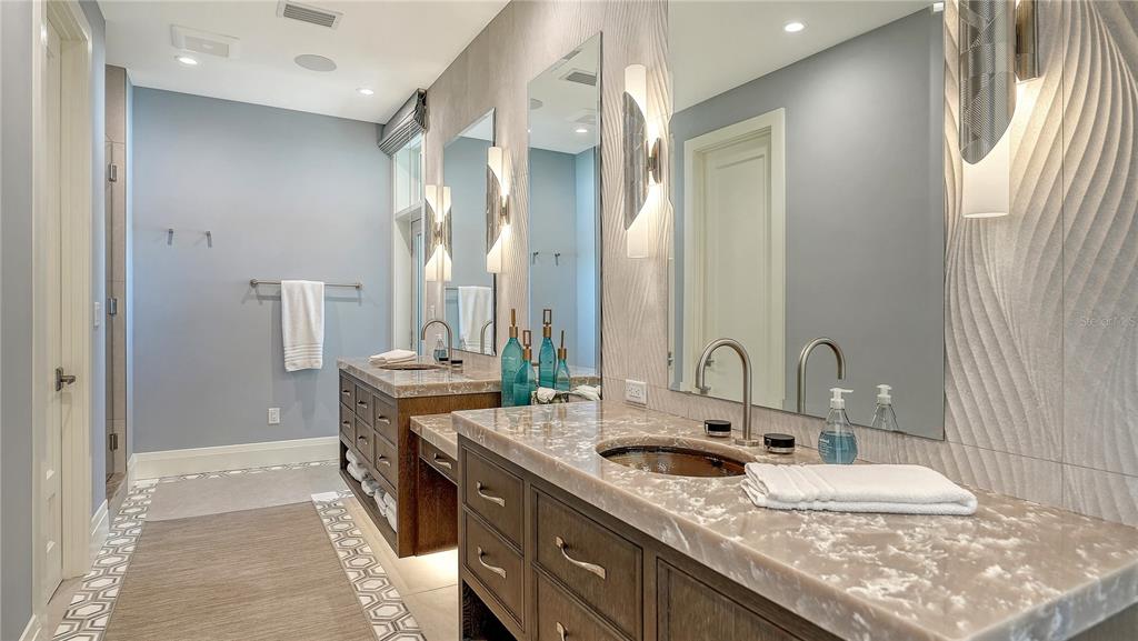 95 52nd Street Holmes Beach, FL 34217 - Photo 42 of 73 a bathroom with a granite countertop double vanity sink and mirror
