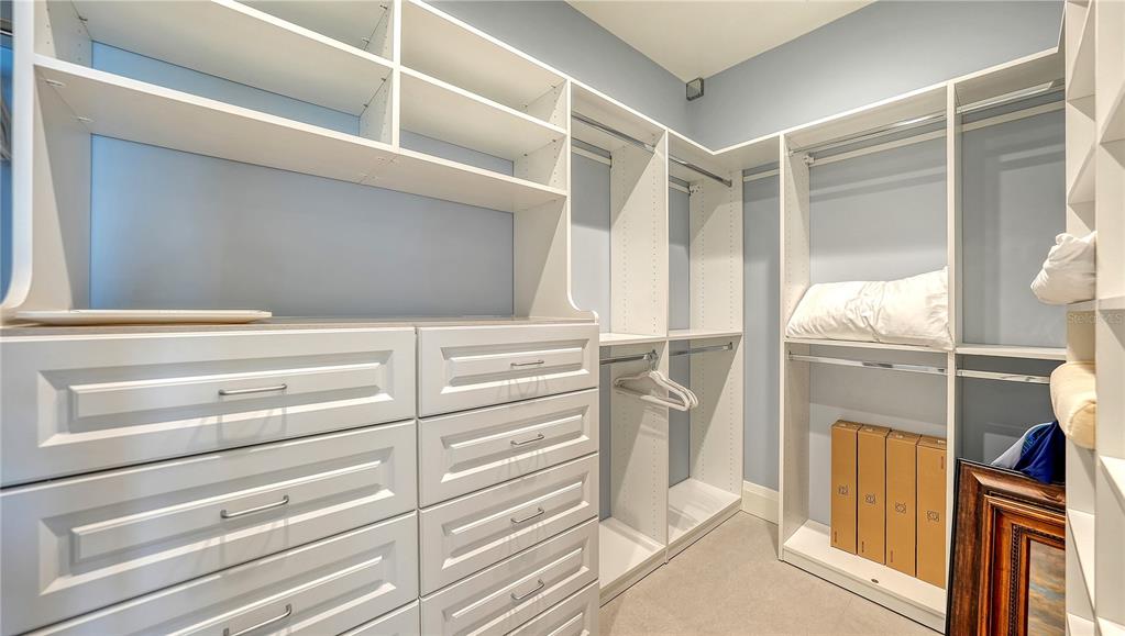 95 52nd Street Holmes Beach, FL 34217 - Photo 43 of 73 a view of walk in closet with empty racks