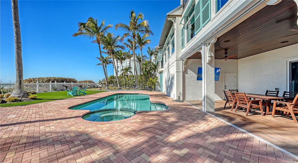 95 52nd Street Holmes Beach, FL 34217 - Photo 63 of 73 a view of a house with a yard