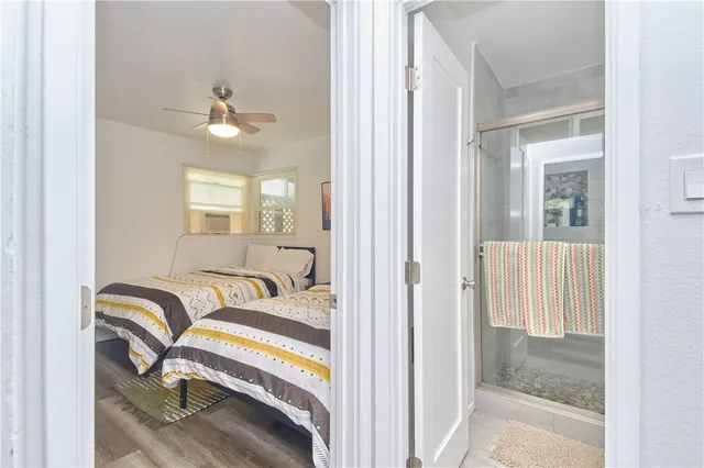 a view of a livingroom with a couch and chandelier