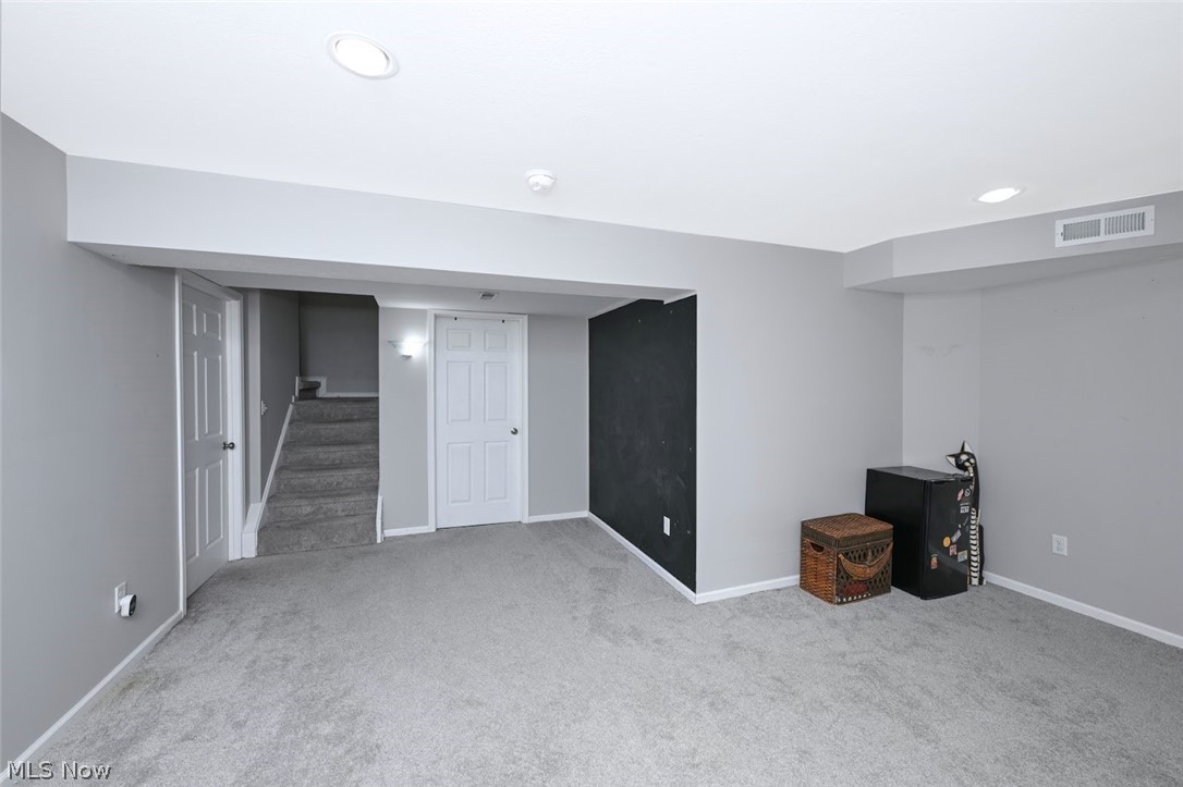 3880 Selnik Road Kent, OH 44240 - Photo 36 of 46 *BASEMENT FINISHED RECREATION ROOM ~ ANOTHER COZY AREA FOR COUCHES AND TVS AND YOUR OWN SPACE, MAN CAVE TO WATCH SPORTS GAMES