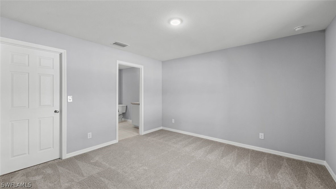 3611 39th Street Southwest Lehigh Acres, FL 33976 - Photo 9 of 17 a view of an empty room