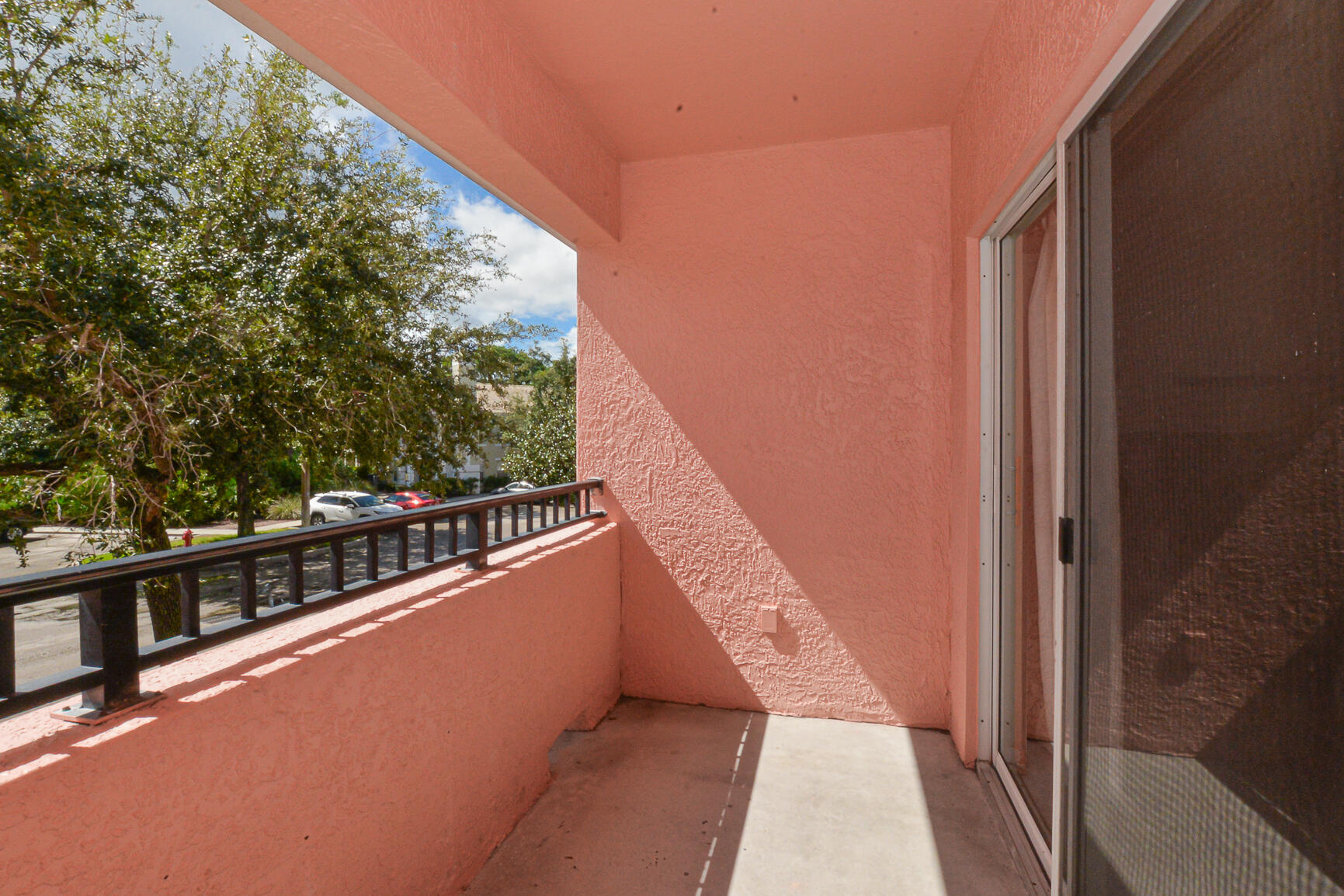 106 Southwest Peacock Boulevard, Unit 4204 Port St. Lucie, FL 34986 - Photo 29 of 47 a view of balcony with couch