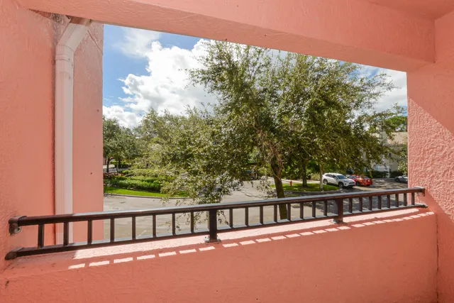 a view of swimming pool from balcony