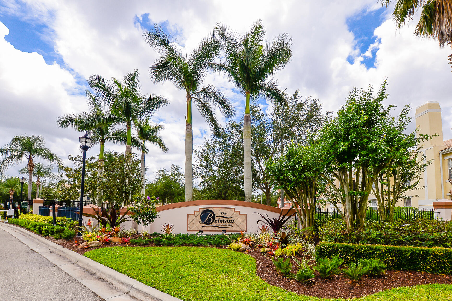 106 Southwest Peacock Boulevard, Unit 4204 Port St. Lucie, FL 34986 - Photo 46 of 47 a view of garden with palm trees