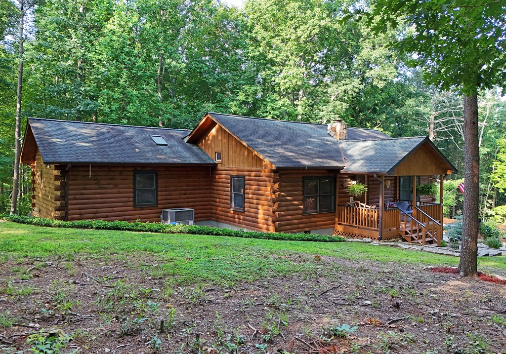90 Log Cabin Road Blairsville, GA 30512 - Photo 3 of 45 a view of a house with a yard