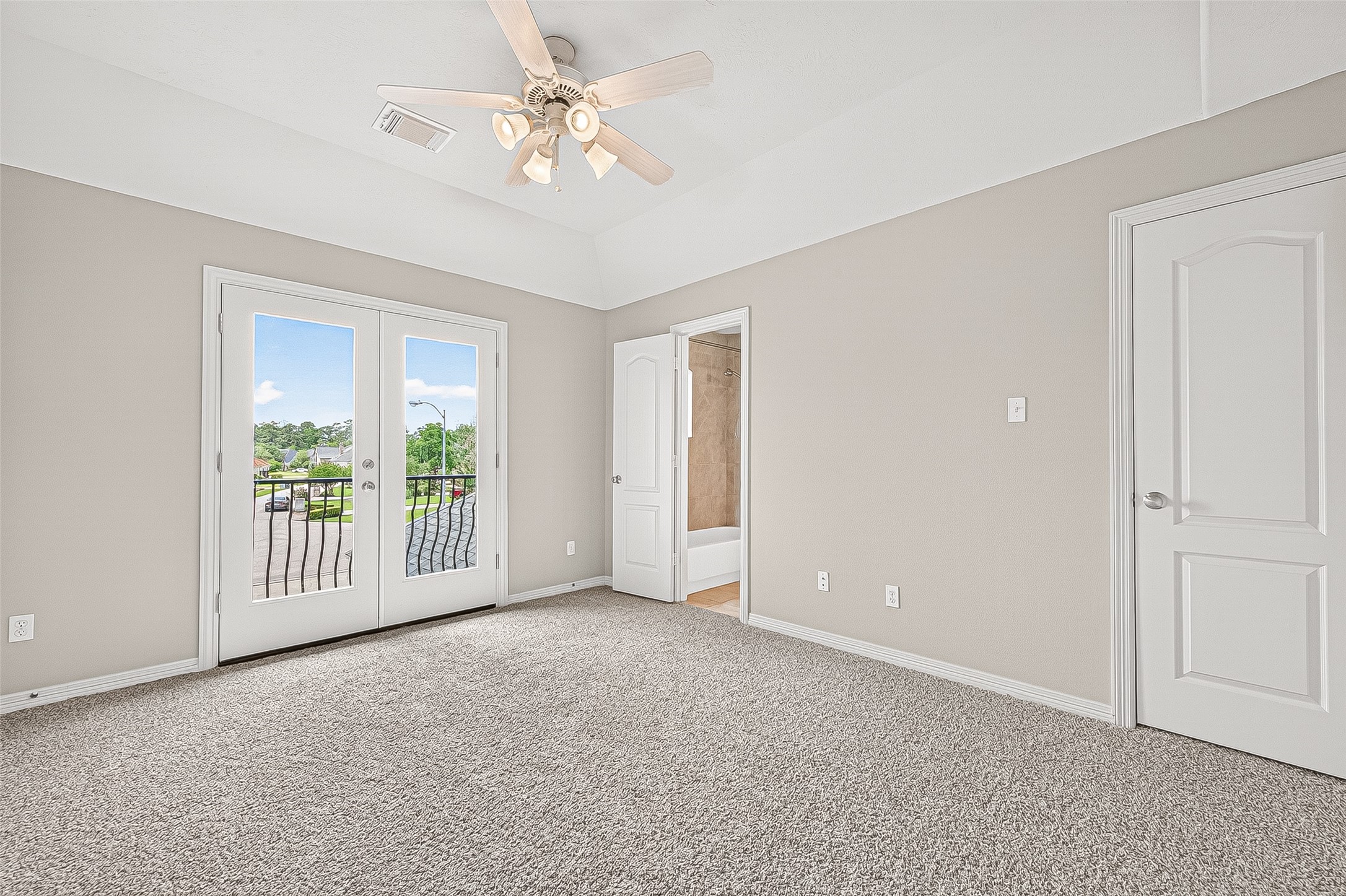 25626 Windy Isle Court Spring, TX 77389 - Photo 27 of 45 Upstairs to the left, we find this bright room at the front. French doors and the balcony offer a charming view.