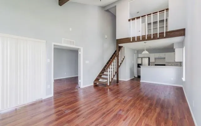 a view of entryway with wooden floor