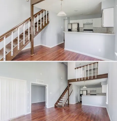 a view of a kitchen with furniture and staircase