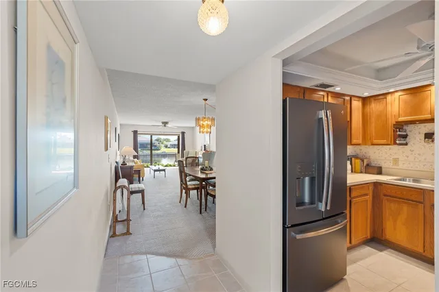 a kitchen with appliances and cabinets