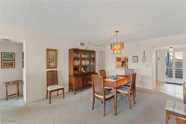 a view of a livingroom with furniture and window