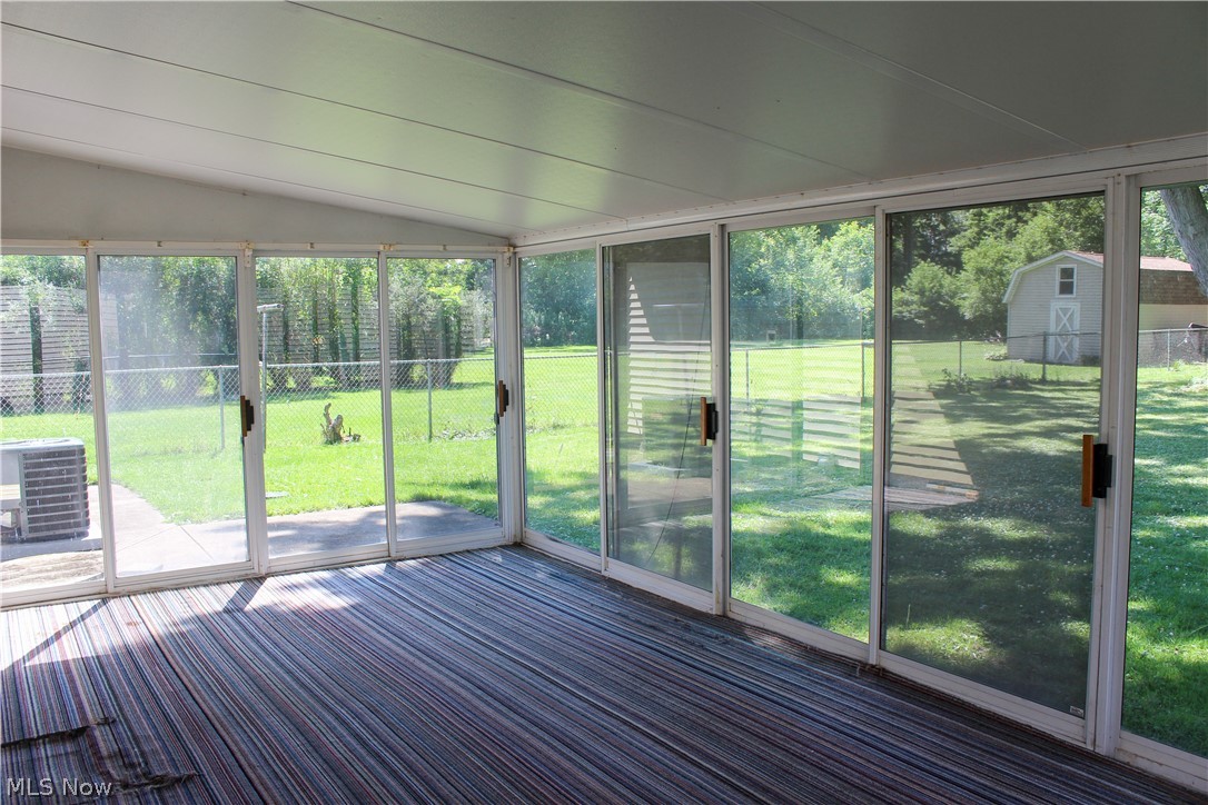 11910 West Lake Road Vermilion, OH 44089 - Photo 22 of 28 Sunroom