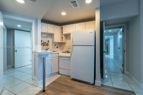 a bathroom with a toilet and shower