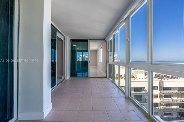a view of an empty room and window
