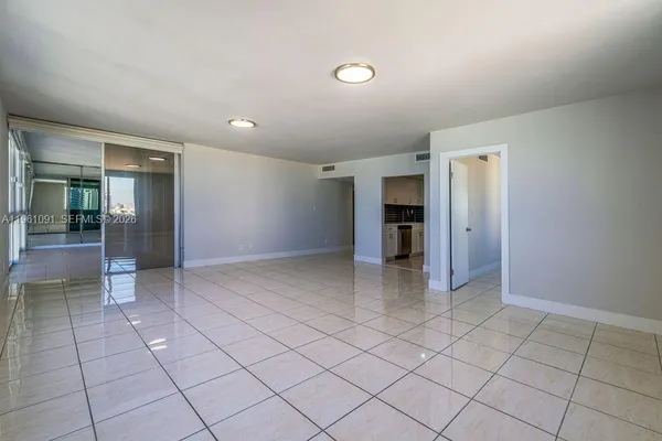 a view of an empty room and window