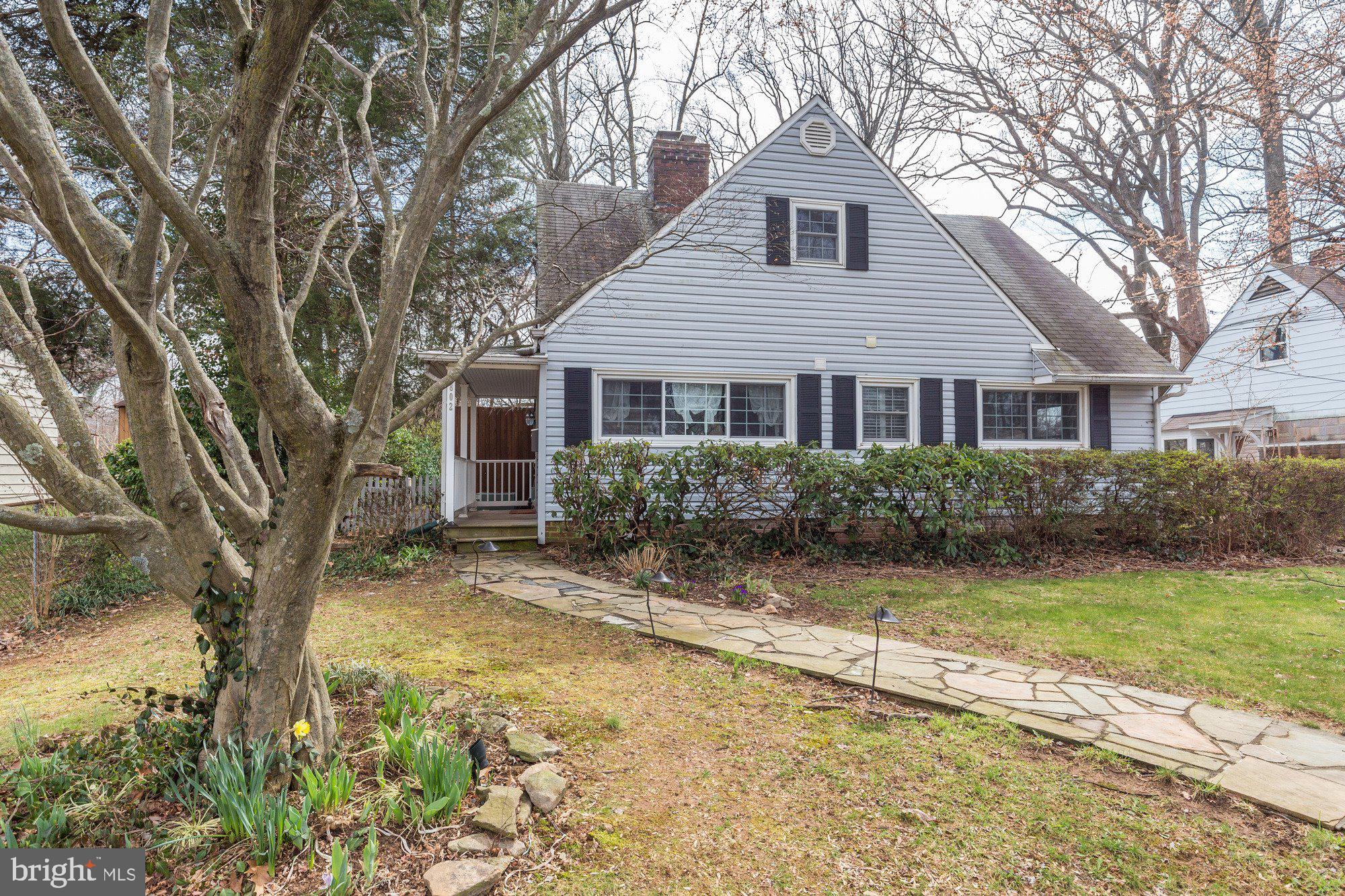 2802 Dawson Avenue Silver Spring, MD 20902 - Photo 2 of 30 a front view of a house with garden