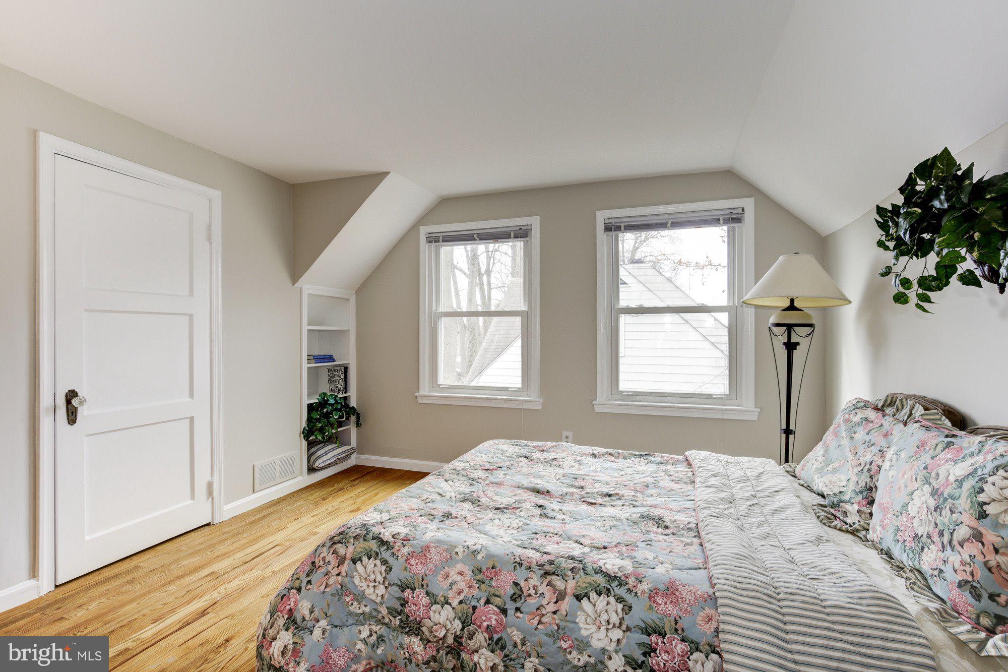 2802 Dawson Avenue Silver Spring, MD 20902 - Photo 22 of 30 a bedroom with a bed and a window