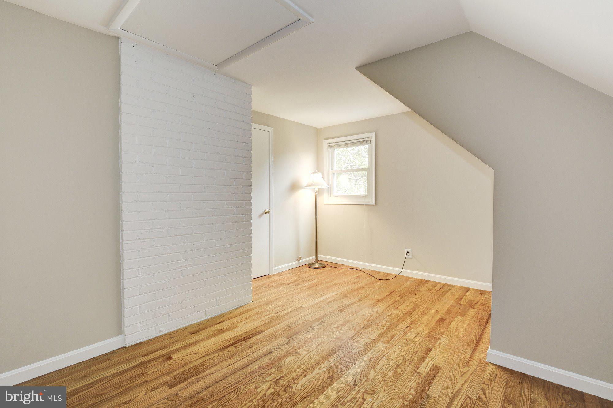 2802 Dawson Avenue Silver Spring, MD 20902 - Photo 24 of 30 a view of empty room with wooden floor