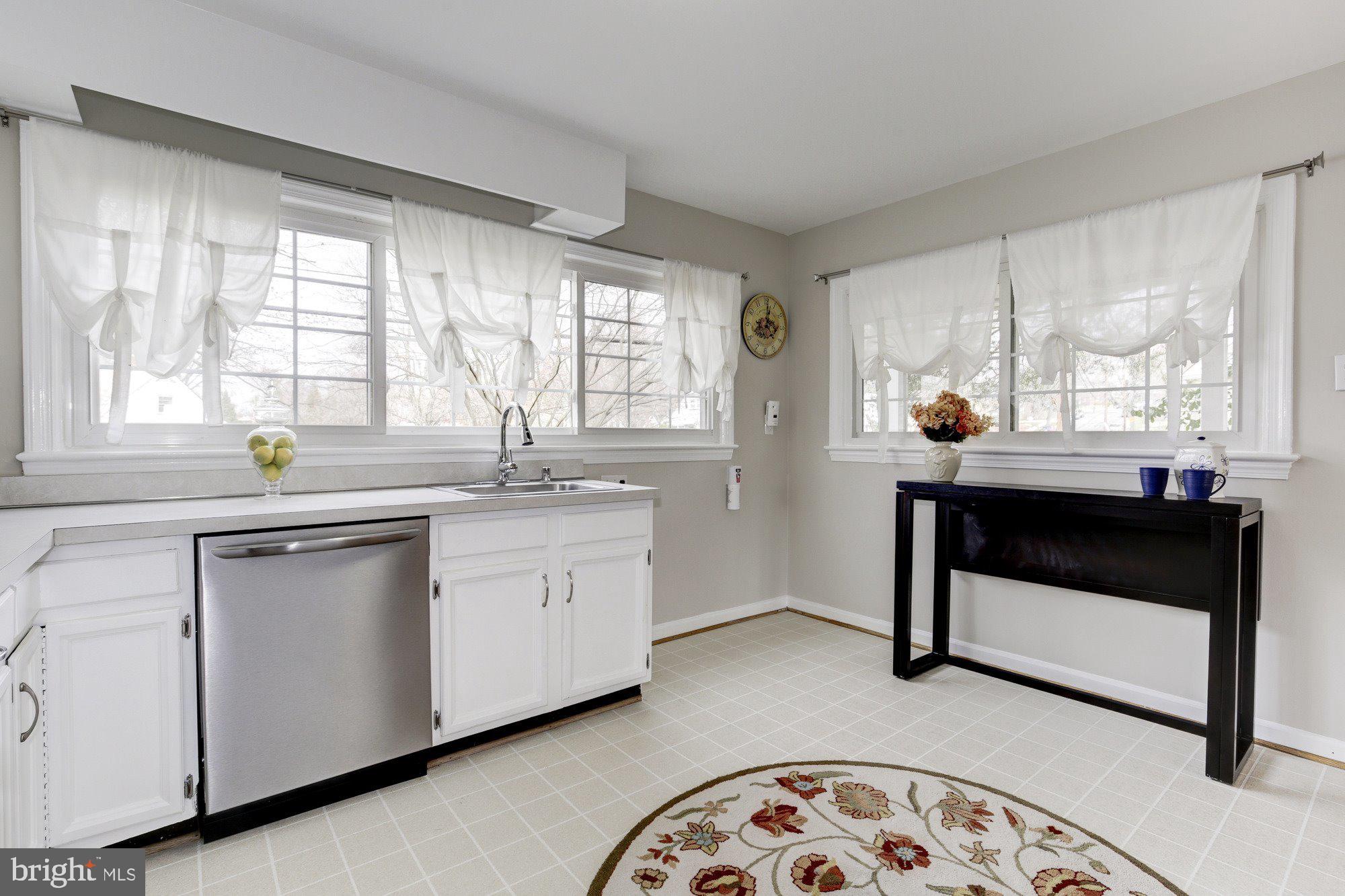 2802 Dawson Avenue Silver Spring, MD 20902 - Photo 8 of 30 a kitchen with a sink and a window