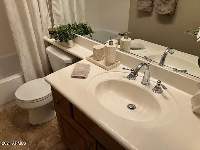 13622 West Merrell Street Avondale, AZ 85392 - Photo 11 of 15 a bathroom with a sink and a toilet