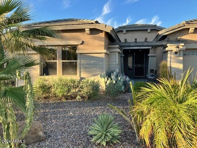 13622 West Merrell Street Avondale, AZ 85392 - Photo 13 of 15 a front view of a house with a yard