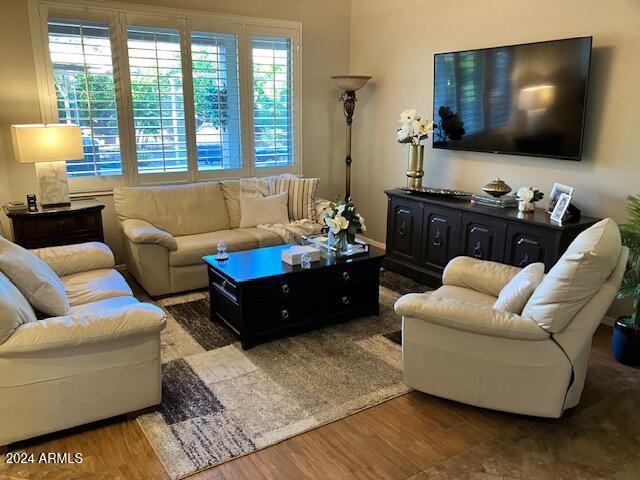 13622 West Merrell Street Avondale, AZ 85392 - Photo 6 of 15 a living room with furniture and a flat screen tv