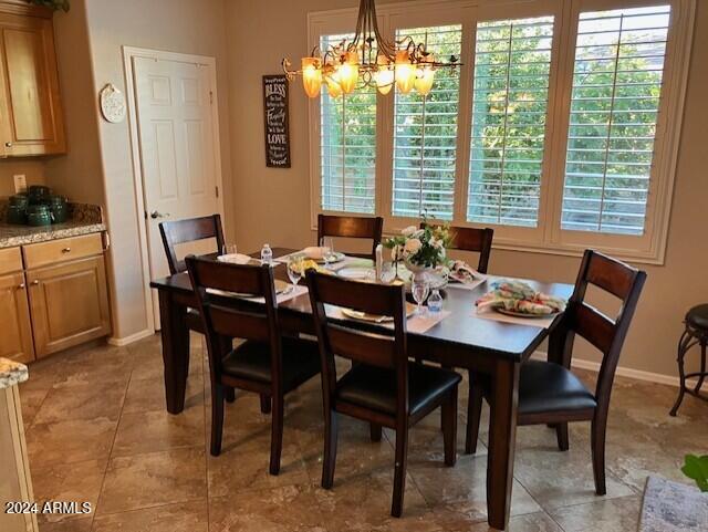 13622 West Merrell Street Avondale, AZ 85392 - Photo 7 of 15 a view of a dining room with furniture window and outside view