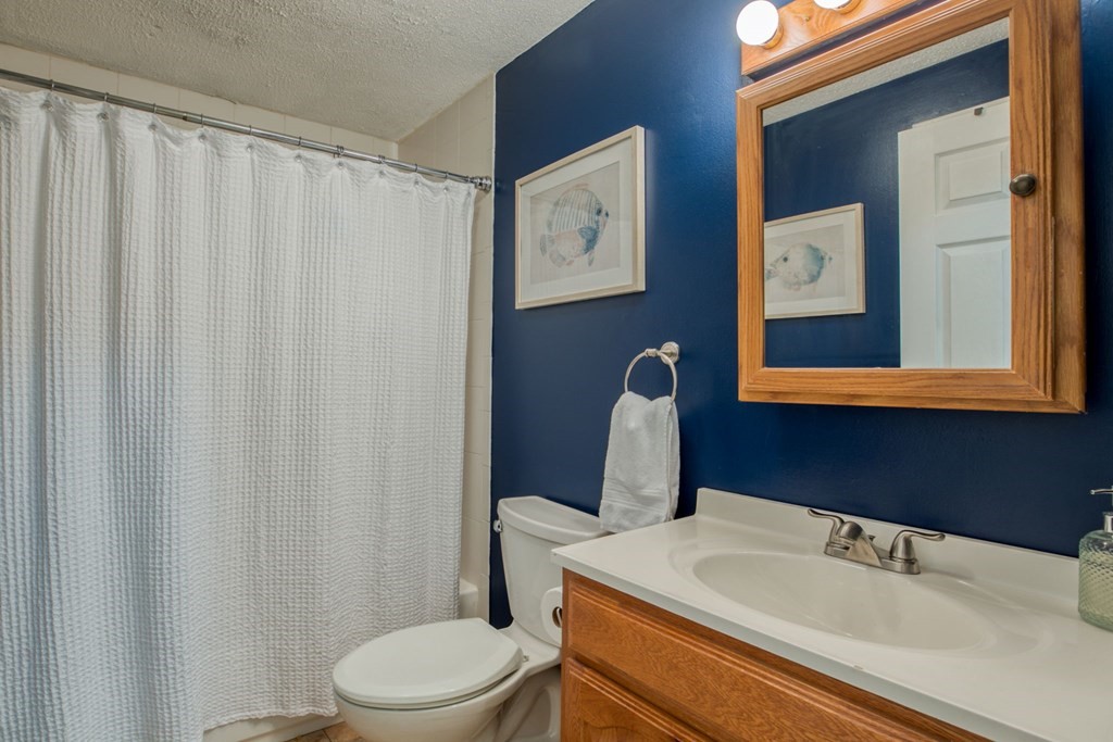67 Aspen Road Springfield, MA 01128 - Photo 12 of 25 a bathroom with a sink and a toilet