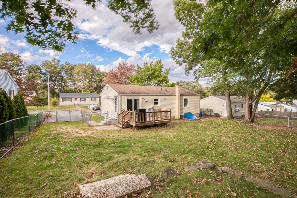 67 Aspen Road Springfield, MA 01128 - Photo 23 of 25 a view of a house with backyard and a tree