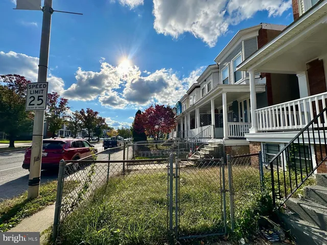 a view of house with yard and entertaining space