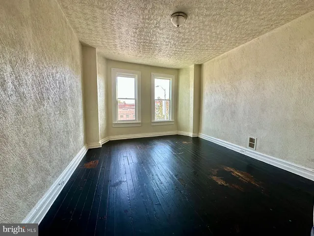 a view of livingroom with hardwood floor and window