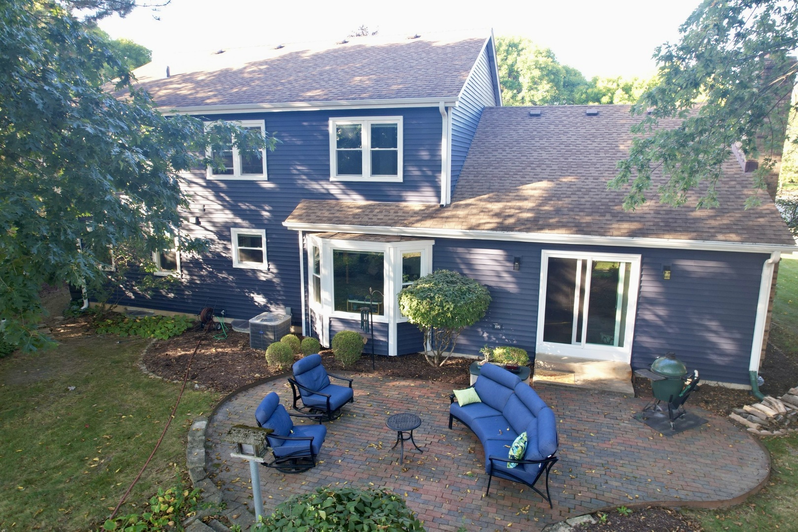 1120 Colgate Court Naperville, IL 60565 - Photo 2 of 3 a view of a house with backyard outdoor seating area and furniture