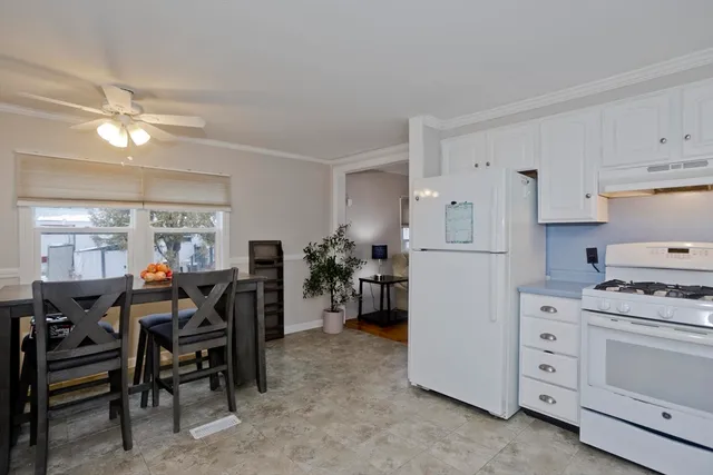 a view of a dining room with furniture