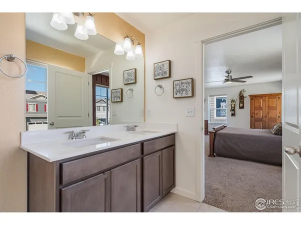 a bedroom with a bed and dresser