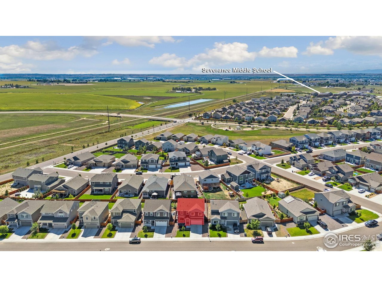 1233 Lily Mountain Road Severance, CO 80550 - Photo 42 of 44 a city view with tall buildings